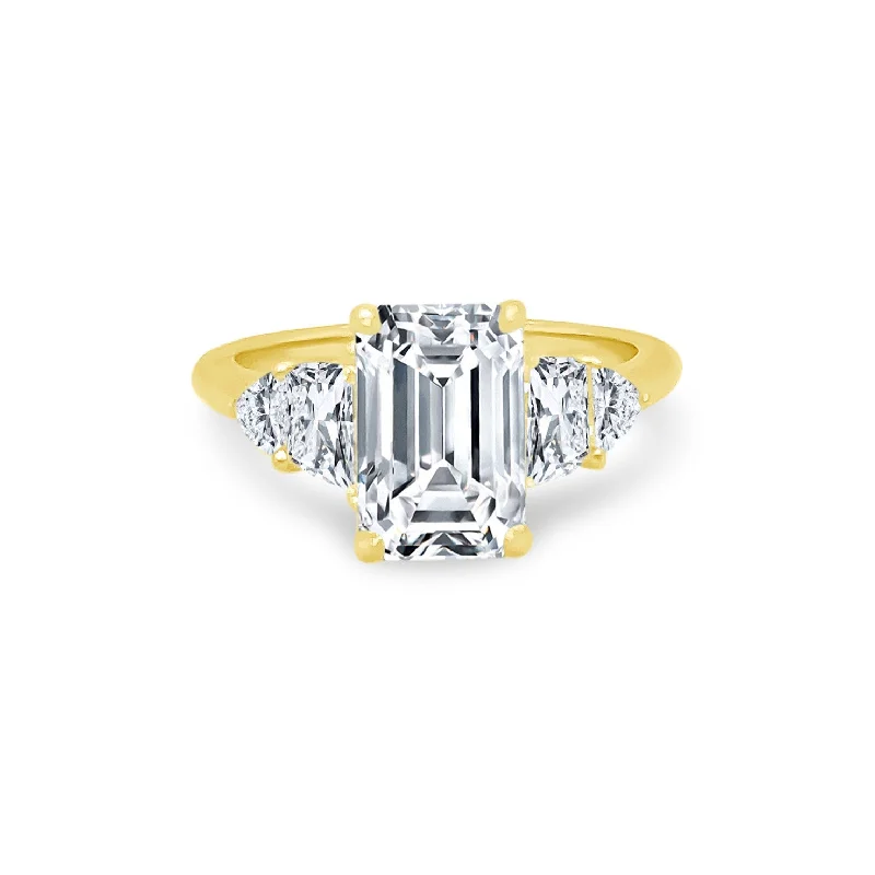 Women's rings celebratory-glow-Emerald Cut Diamond with Trapezoid and Trillion Side Stones