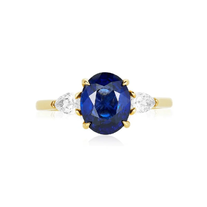 Women's rings vivid-gleam-Oval Cut Sapphire with Pear Cut Diamond Side Stones