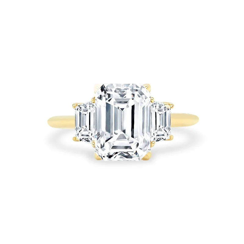 Women's rings artisan-gleam-Emerald Cut with Trapezoid Cut Side Stones