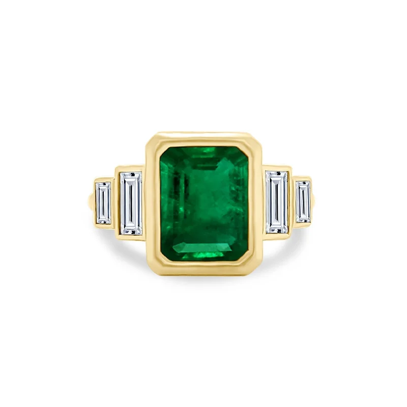 Women's rings glowing-detail-Bezel Set Emerald Cut Emerald with Double Baguette Cut Diamond Side Stones