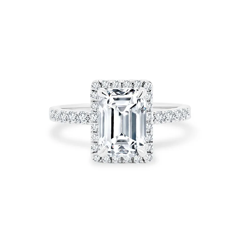 Women's rings contoured-wave-Emerald Cut Solitaire with Halo on Diamond Band