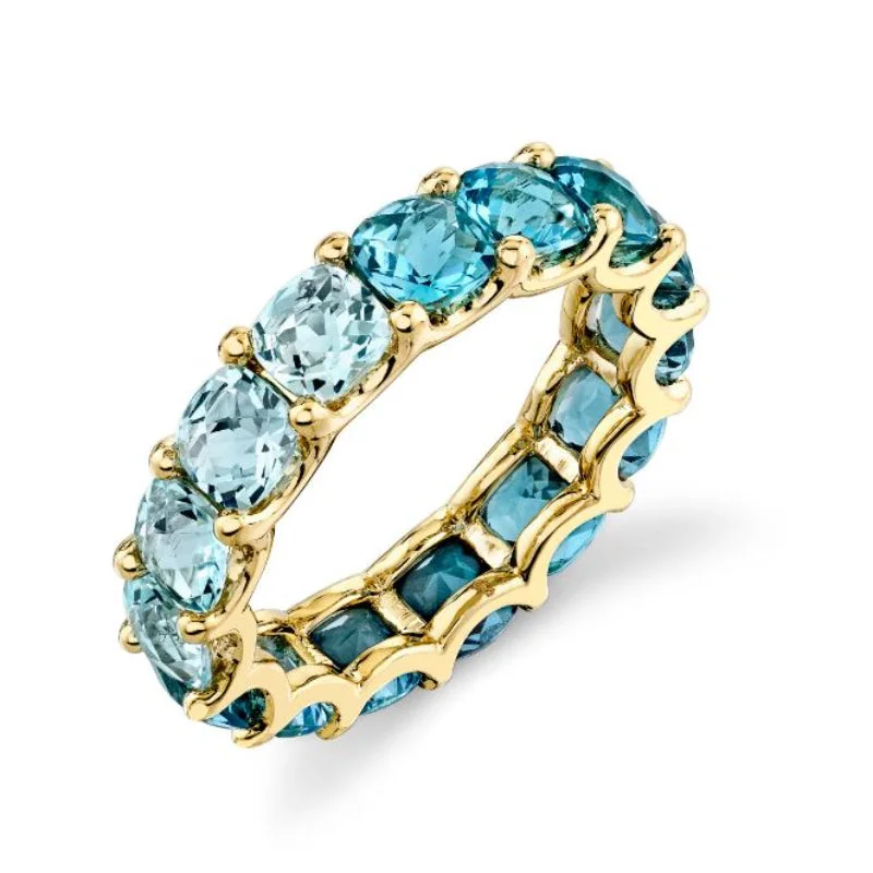 Women's rings radiant-coil-18K Yellow Gold Graduated Blue Topaz Eternity Band